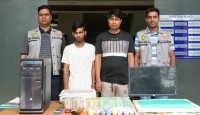 রাজধানীতে বিপুল পরিমাণ জাল নোট ও সরঞ্জামসহ গ্রেফতার দুই